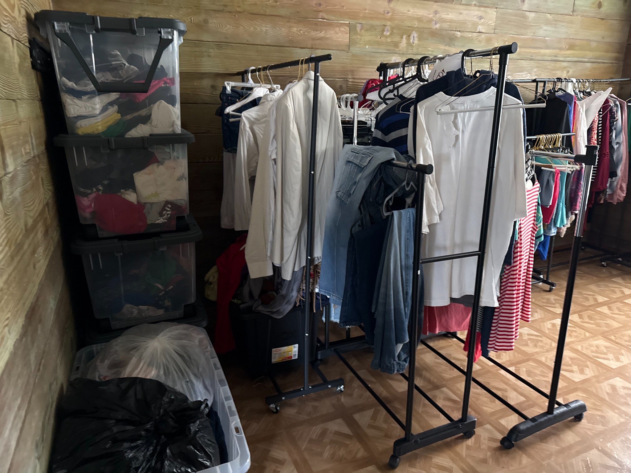 Donated clothing organized for families at God’s Closet