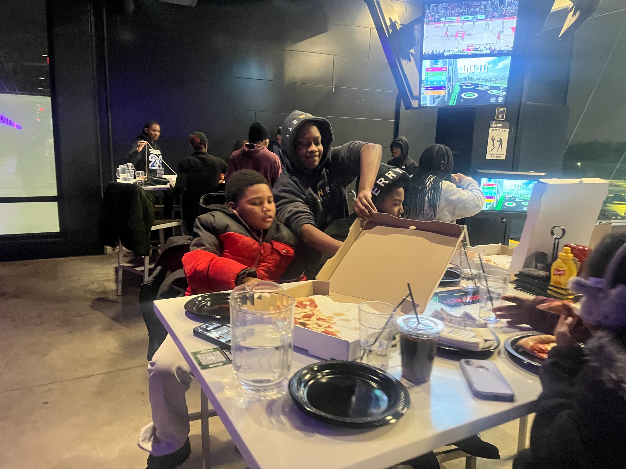 Children sharing a meal during a Joshua Generation outing