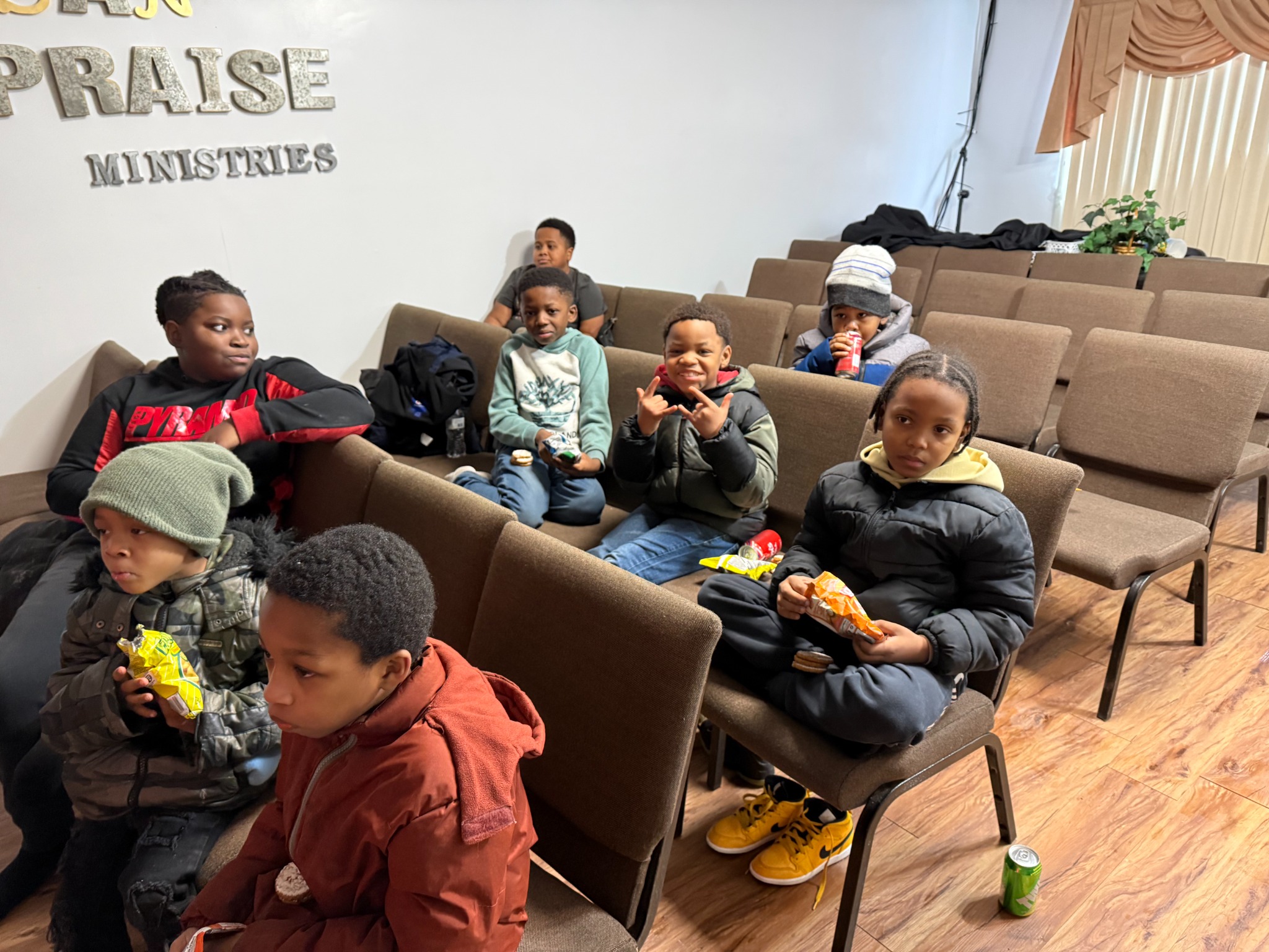 SWAG youth enjoying snacks and fellowship at Urban Praise